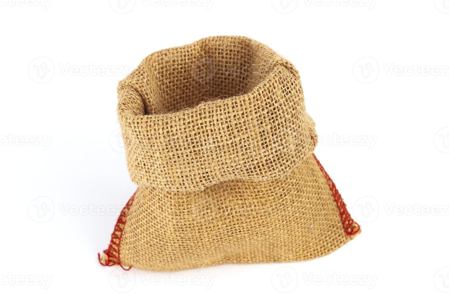 Empty burlap bag or sack to be filled in isolated on white photo
