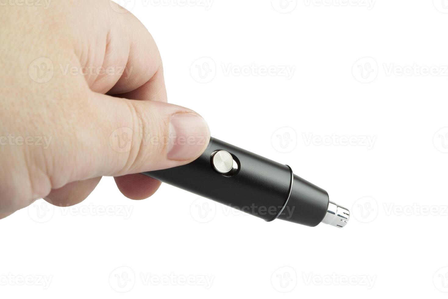 Hand holding a black nose trimmer photo