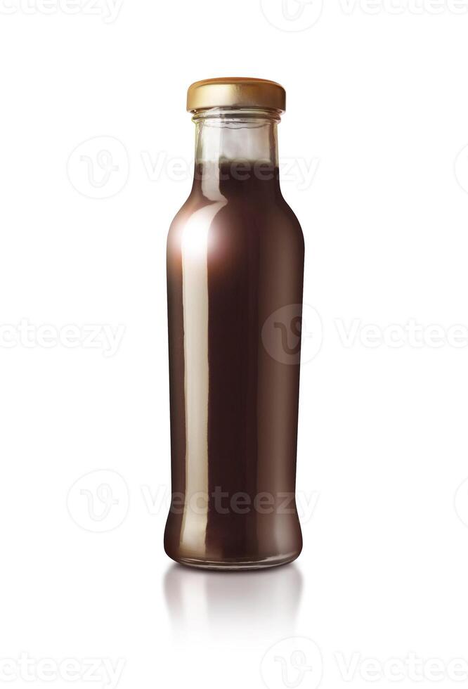 Glass bottle of sauce isolated on white background photo