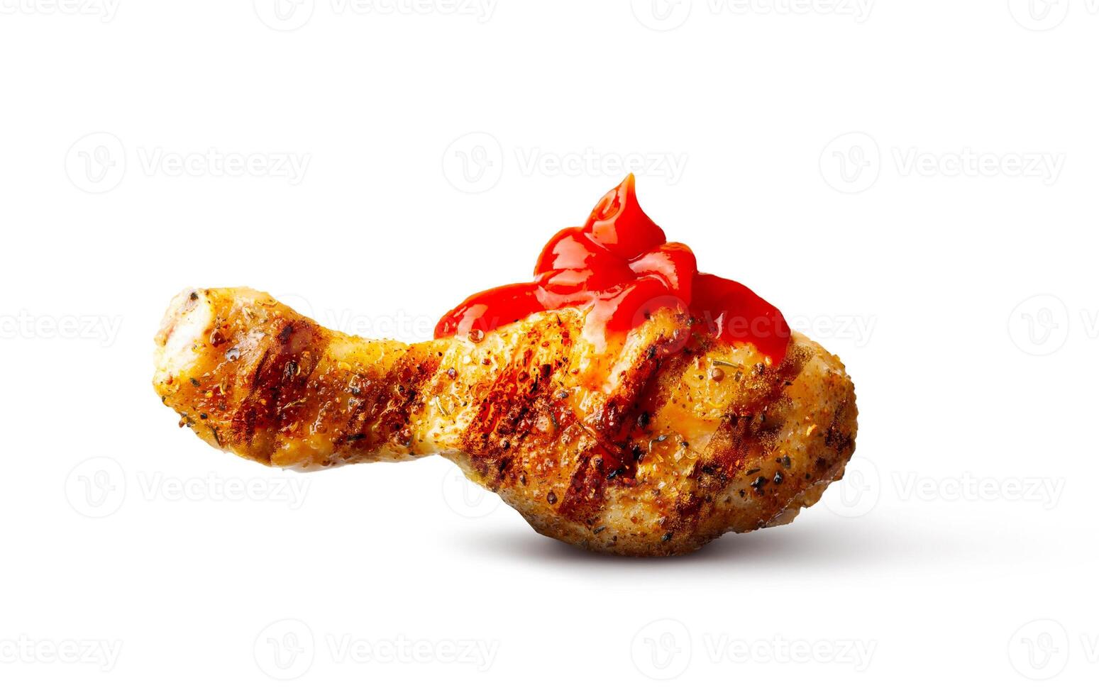 Grilled chicken leg coated with ketchup sauce photo