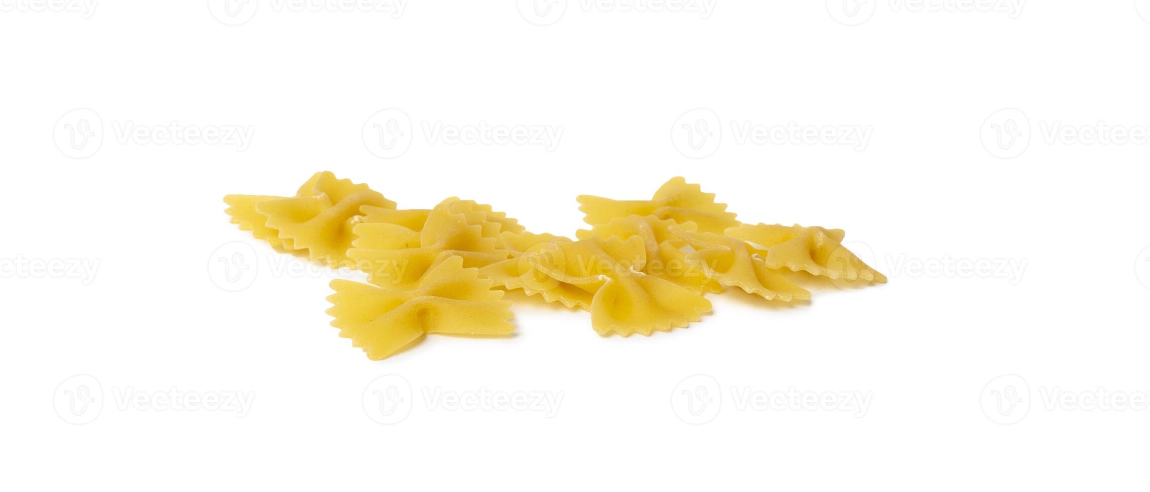 Farfalle pasta isolated on white background photo