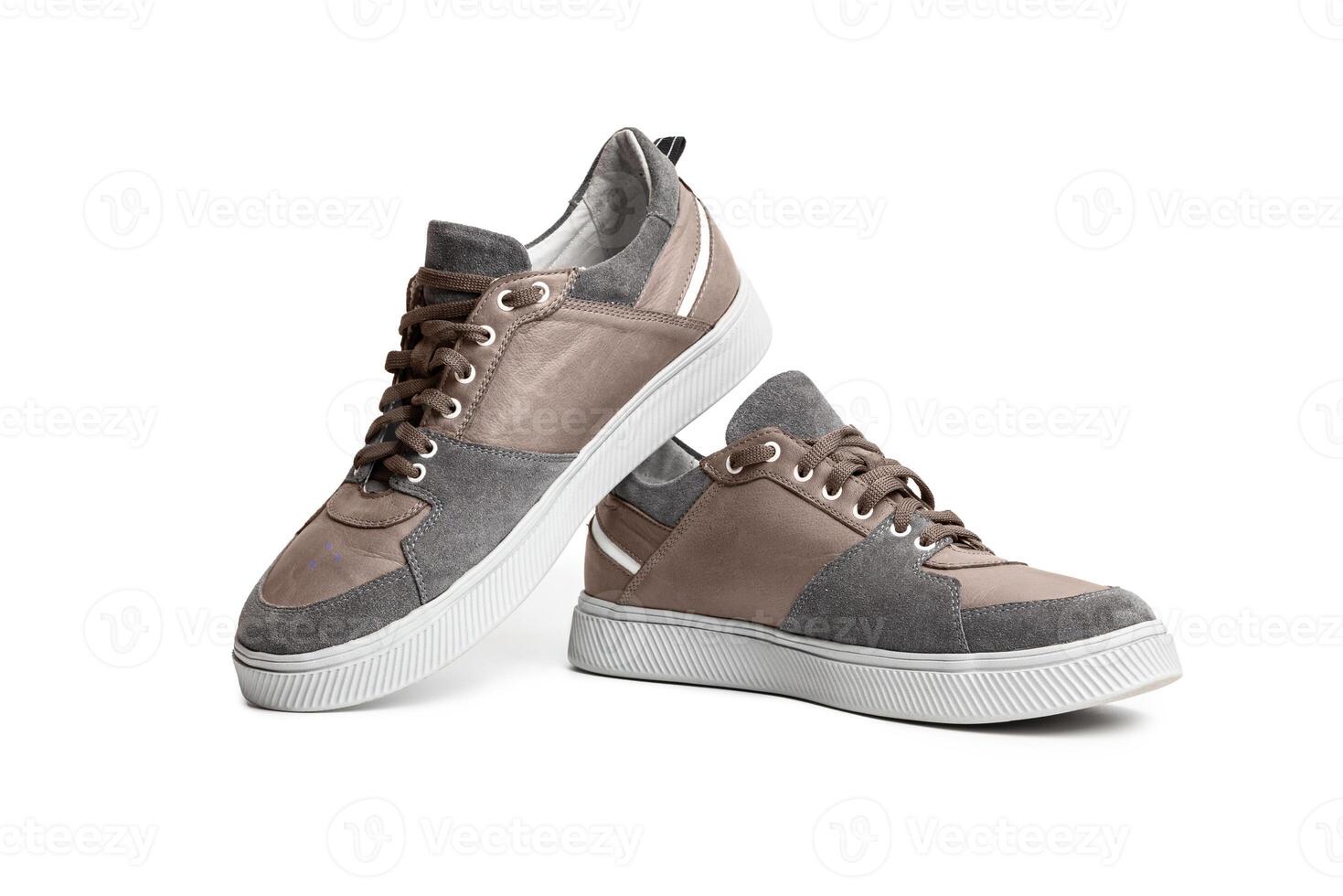 Brown casual sports shoes sneaker isolated on a white background photo