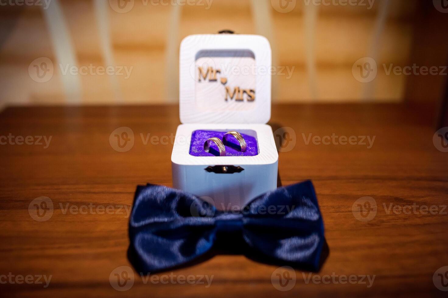Bow tie and Wedding rings. Wedding decoration photo