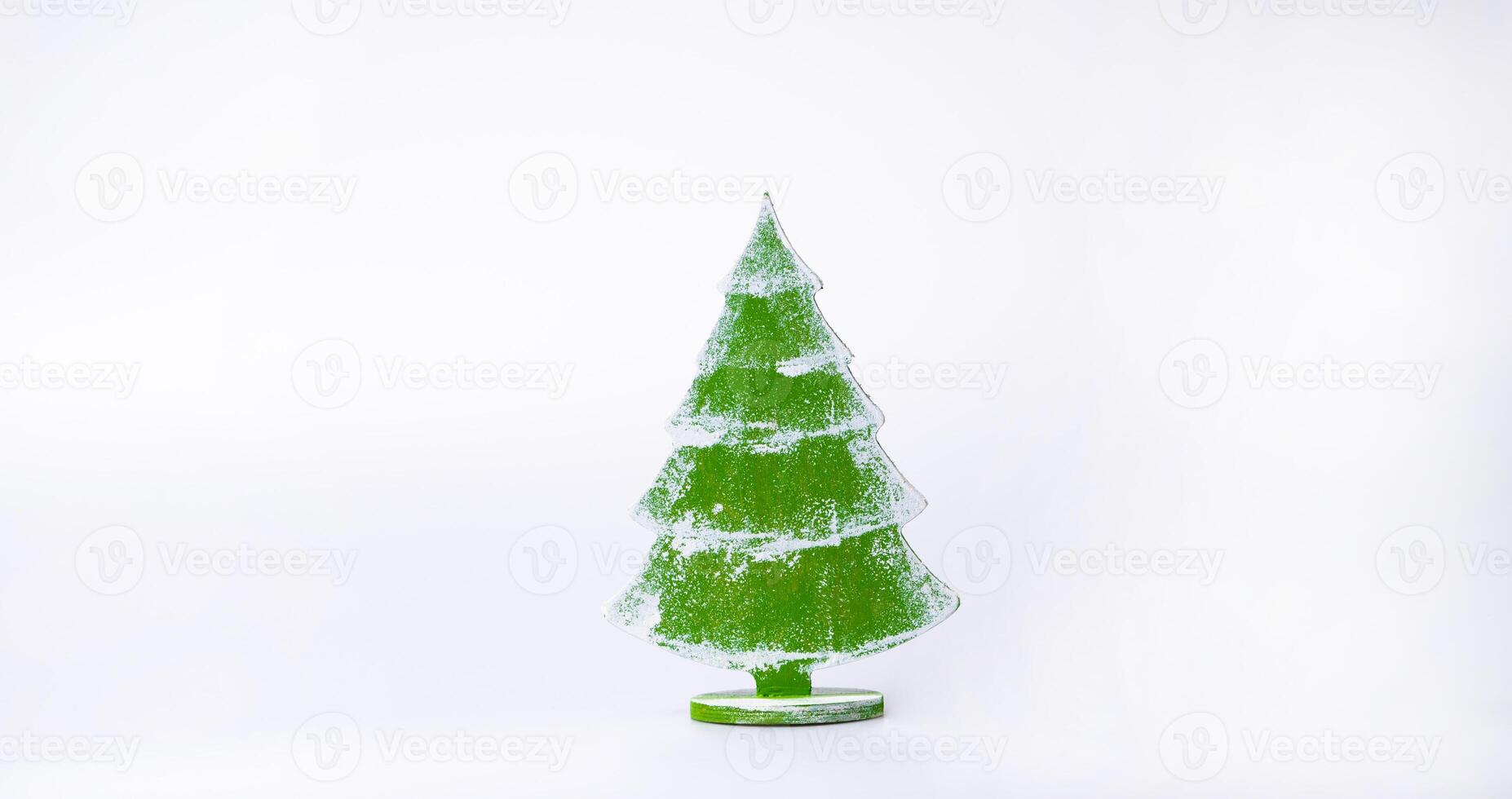 Wooden Christmas tree. Christmas or New Year minimal concept. photo