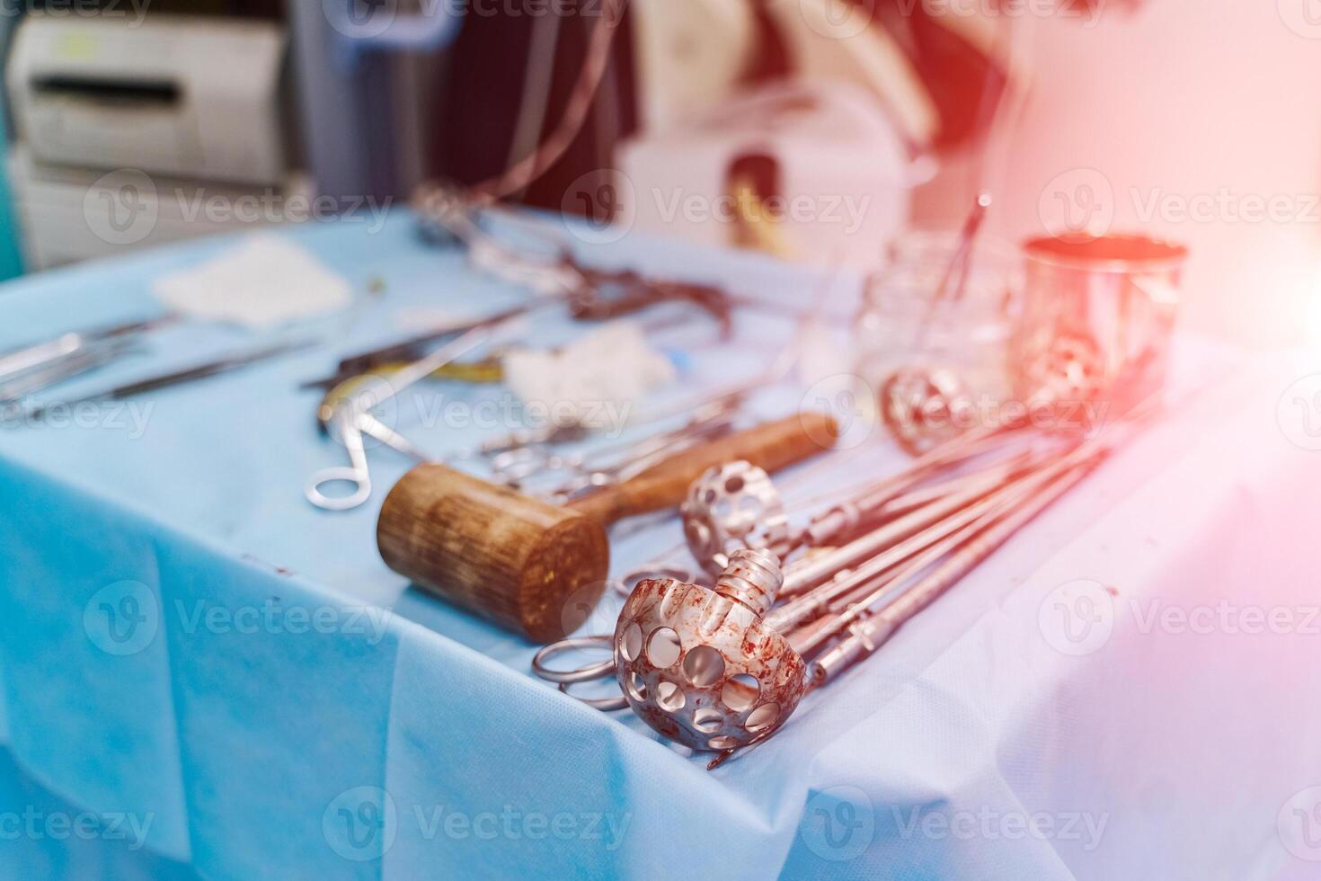 New surgery operating equipment. Surgery instruments on the operating table. Instruments after surgery operation. Room side view. Closeup. photo