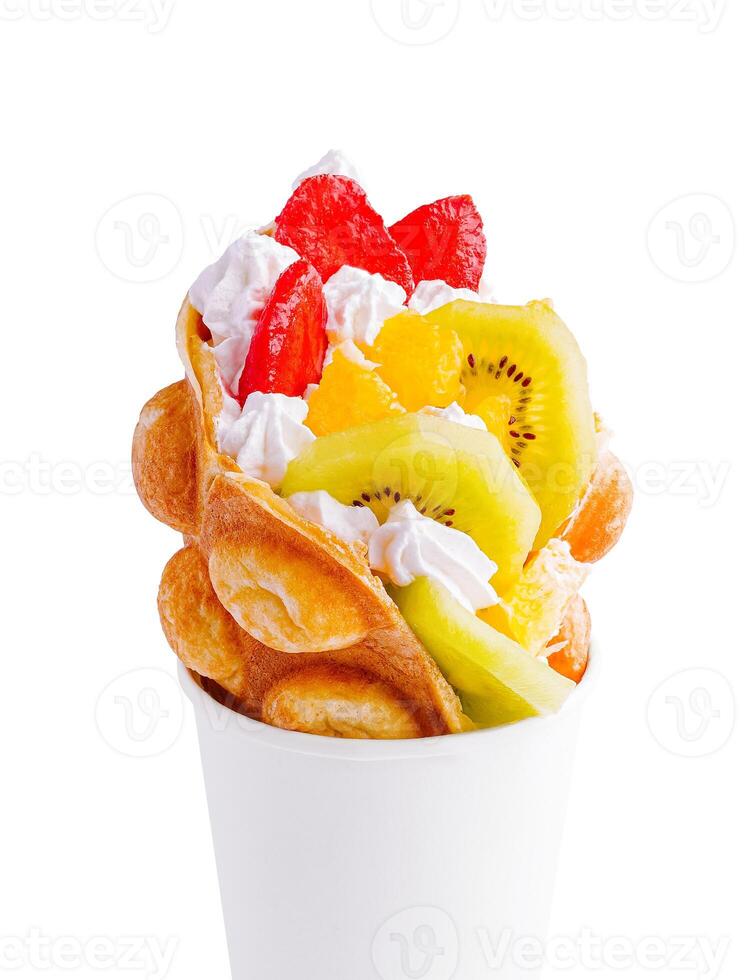 Bubble Waffle with kiwi, and whipped cream strawberry photo