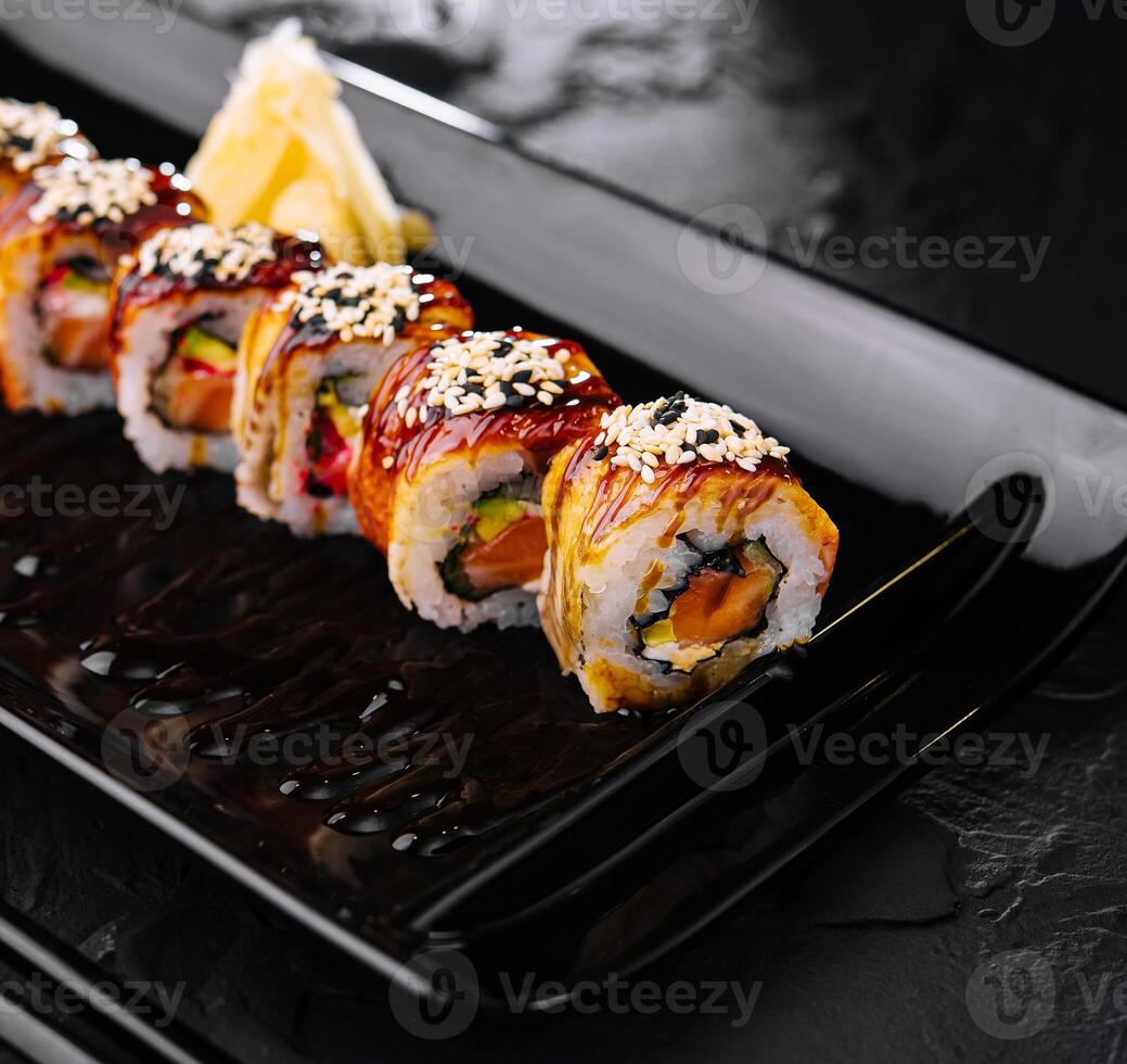 Traditional canada sushi roll on plate photo