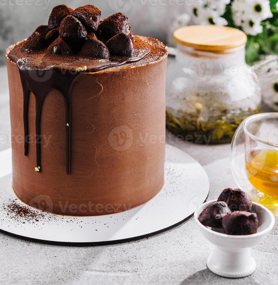 chocolate cake with truffles and tea photo