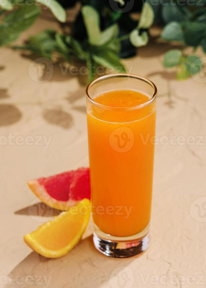 Citrus juice with orange and grapefruit top view photo