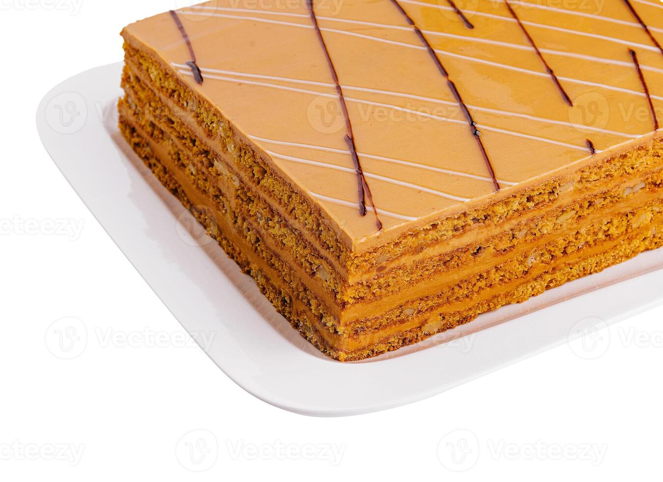 Coffee Walnut Layer Cake on white plate photo