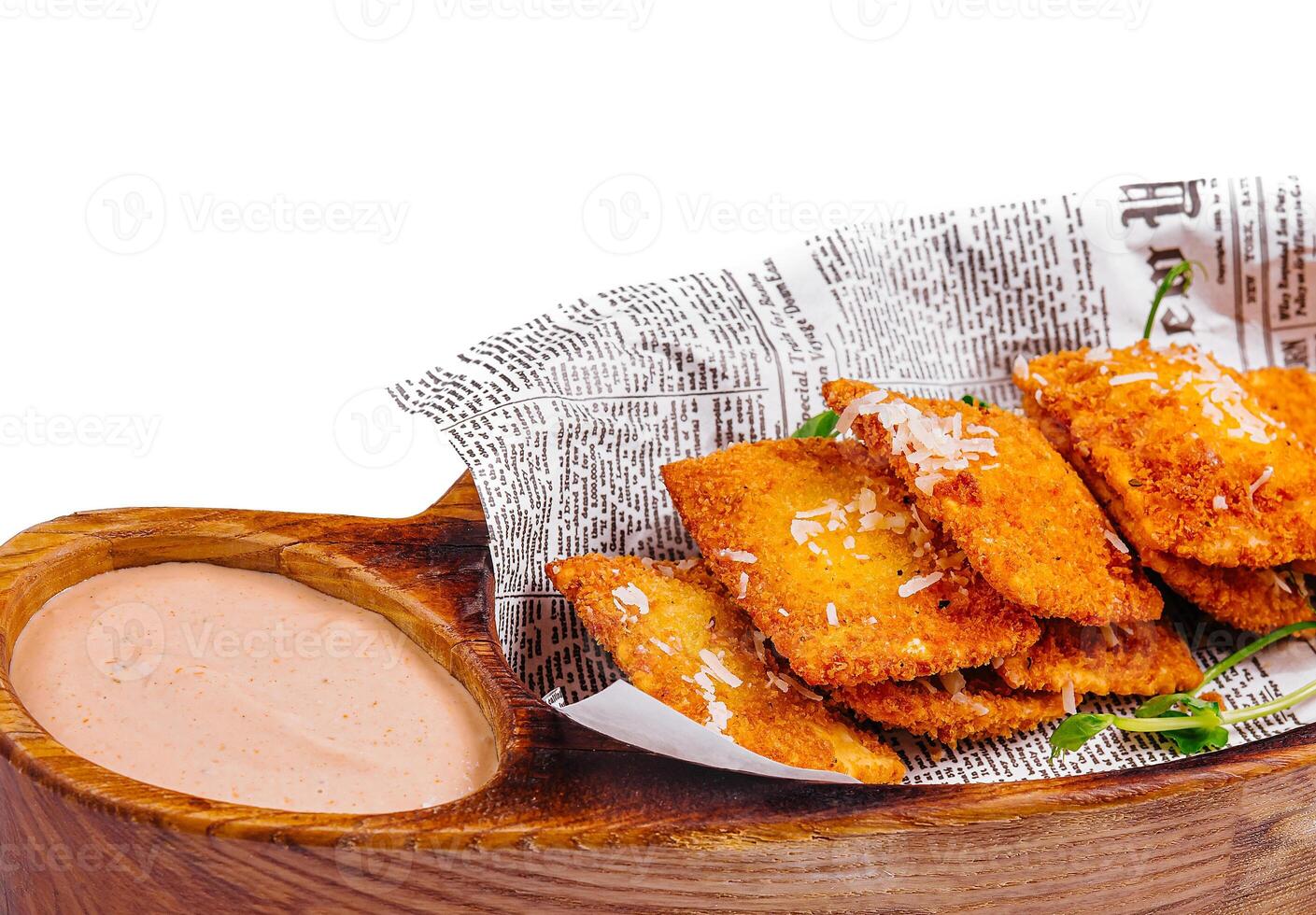 Fried cheese empanadas on wooden board photo