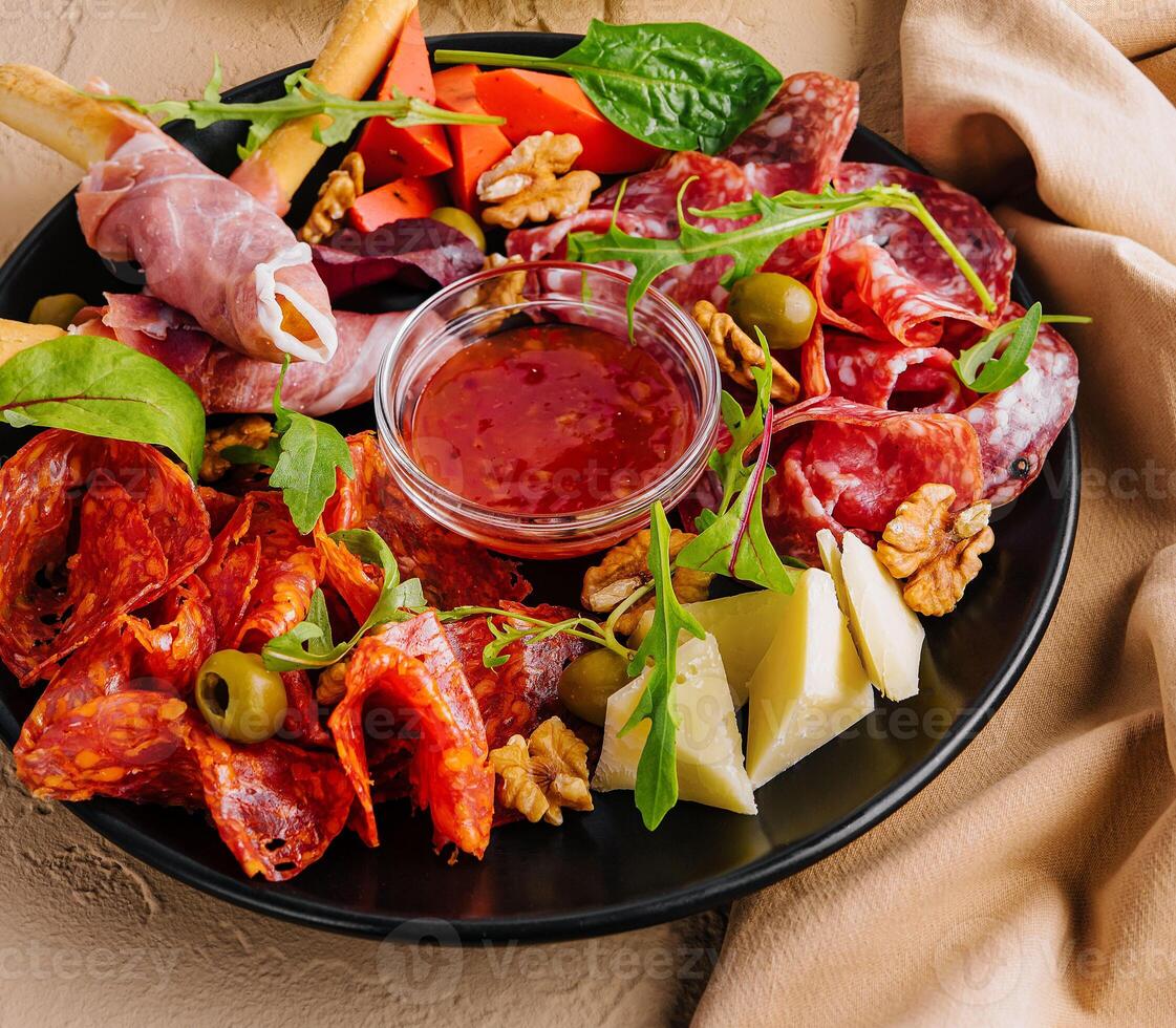 Appetizers table with antipasti snacks photo