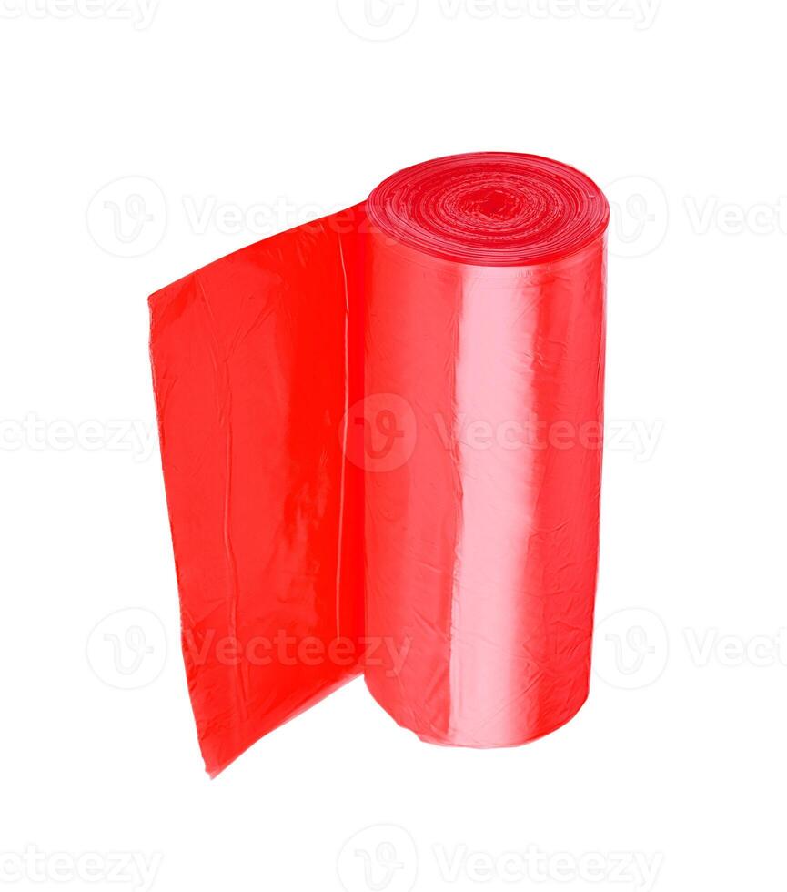 roll of red plastic garbage bags isolated on white background photo