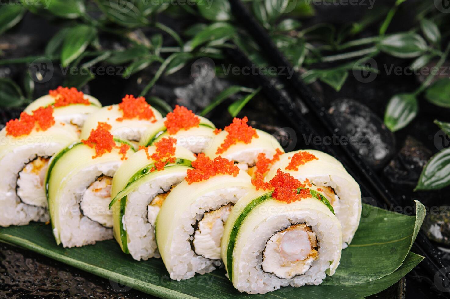 Sushi set with cheese, rice, shrimp and cucumber photo