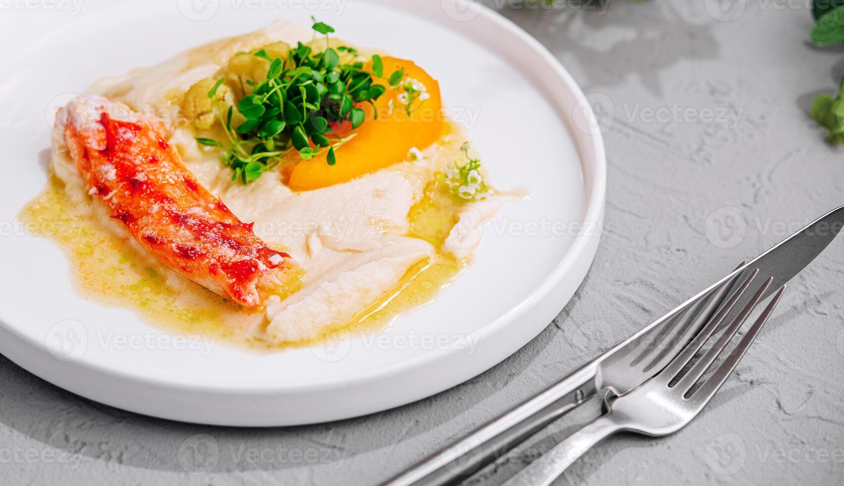 celery puree with crab on plate photo