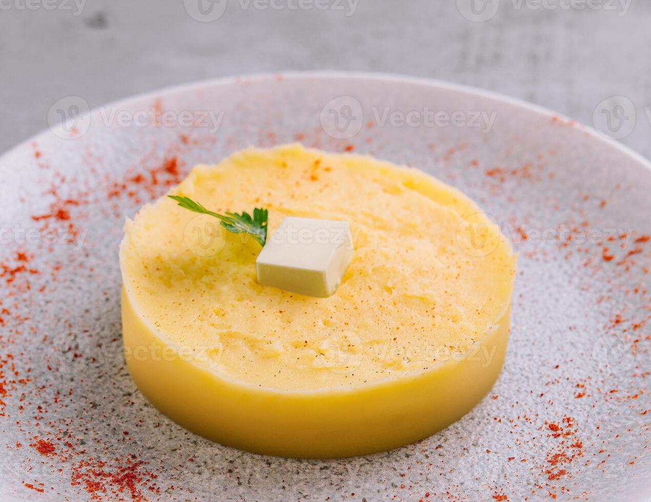 Mashed Potatoes with Butter on plate photo