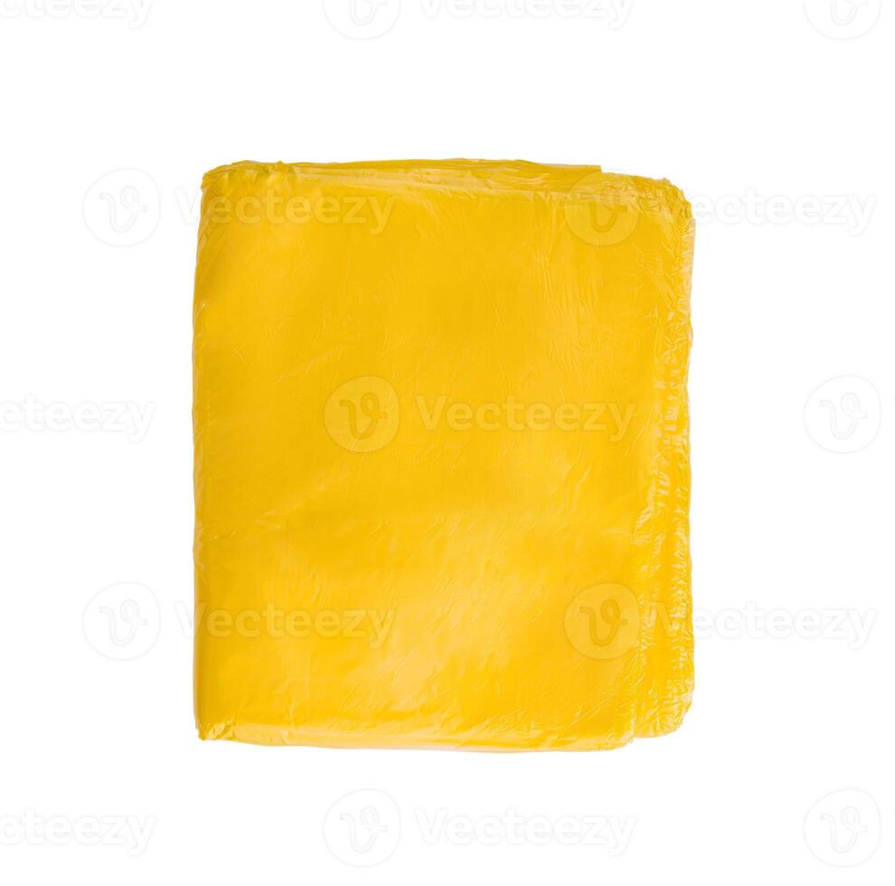 Yellow plastic bag isolated on white background photo
