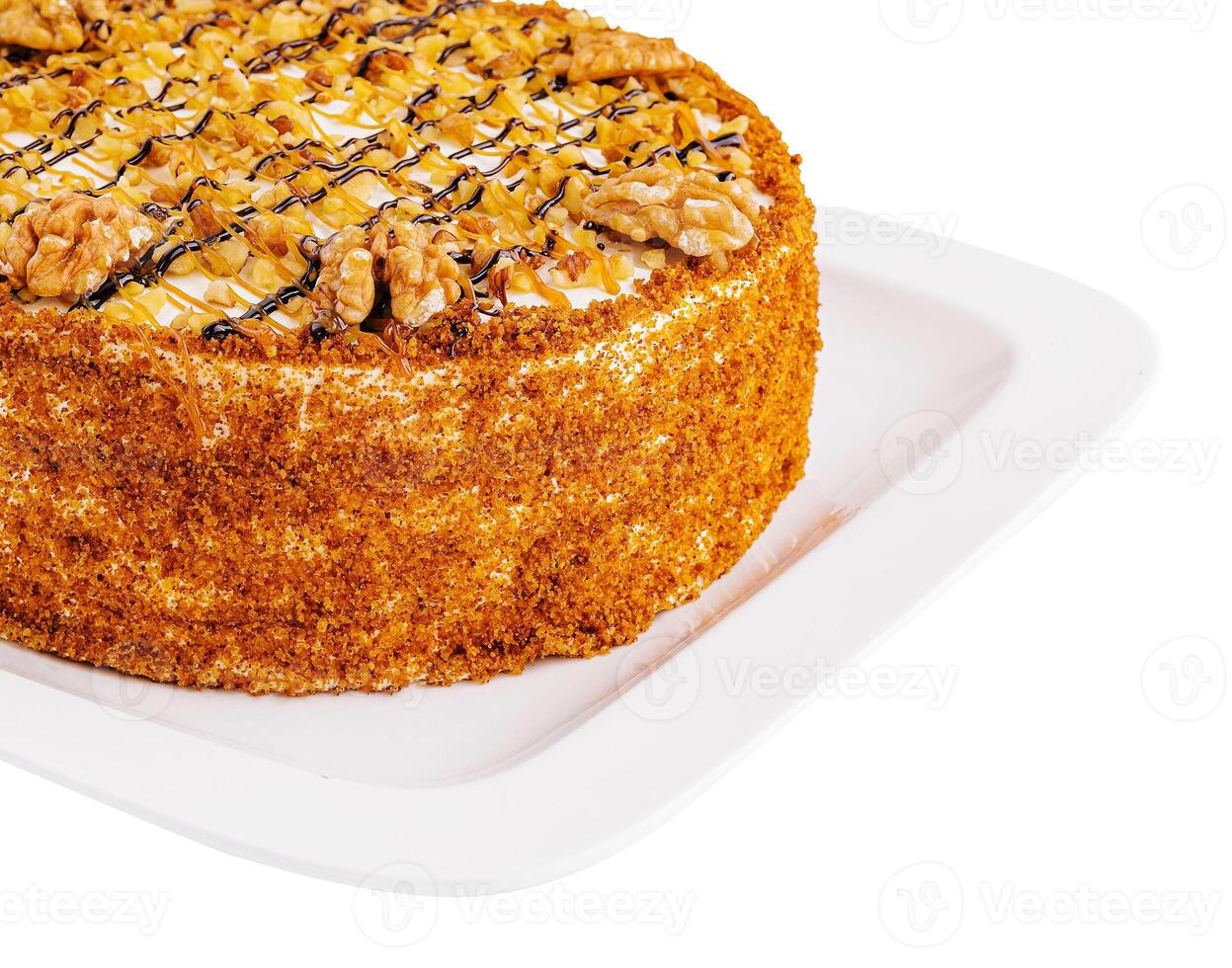 pastel con nueces y miel en plato foto