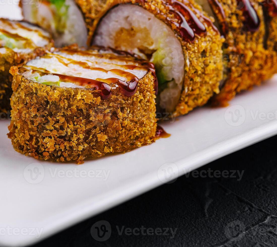 Tempura Maki Sushi on white plate photo