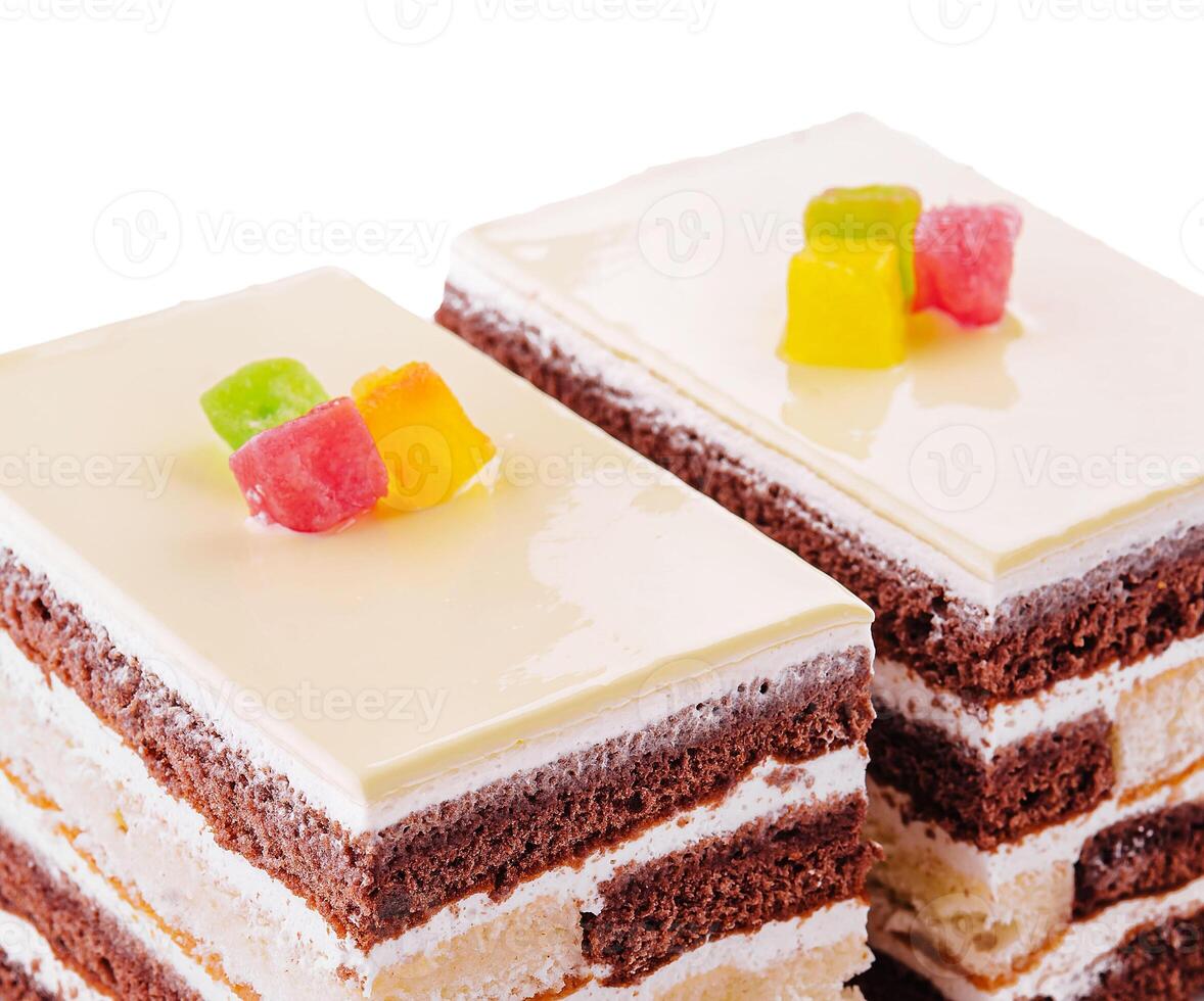 Delicious multilayer cocoa sponge cake with sugar mass photo