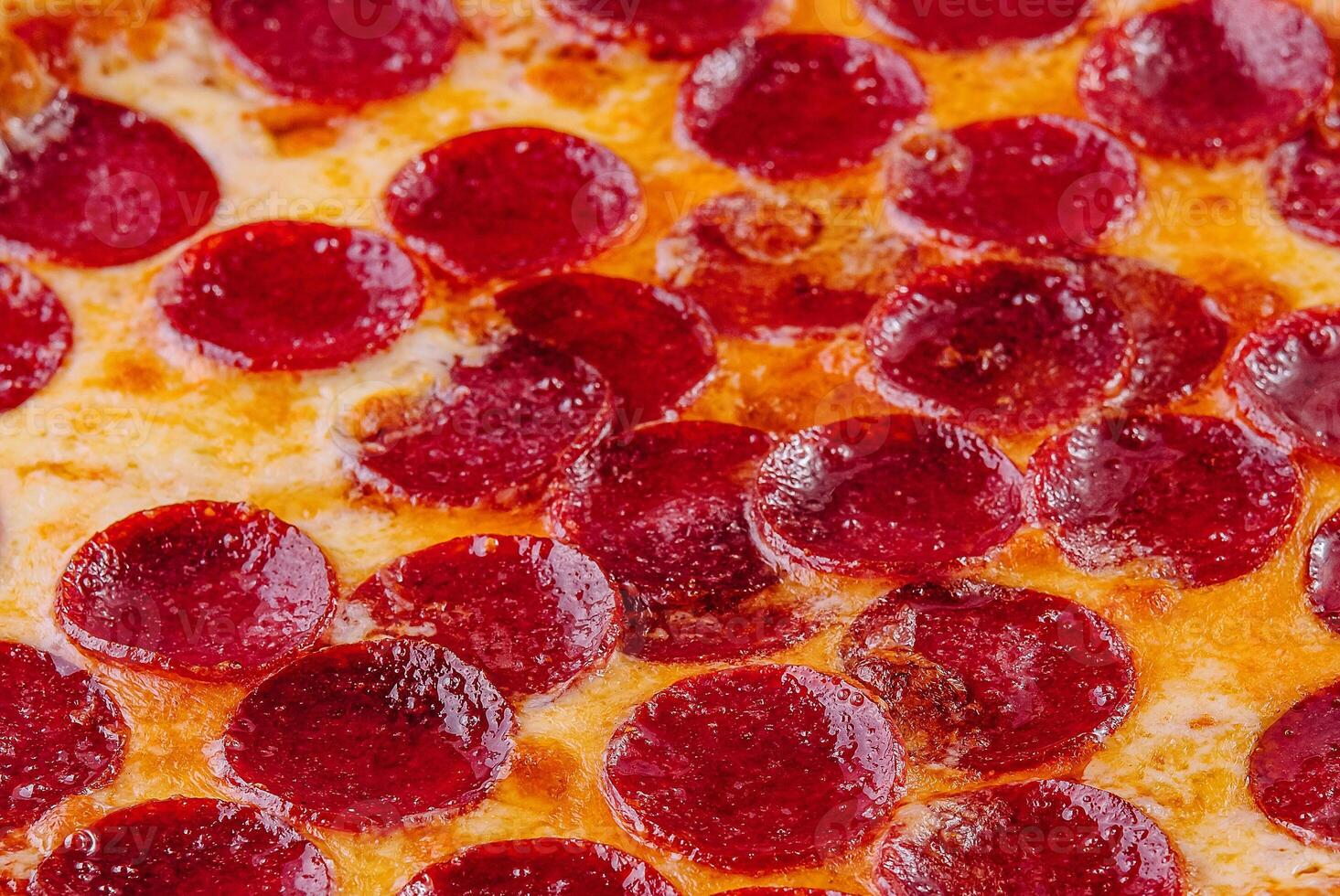 Pepperoni pizza with salami top view photo