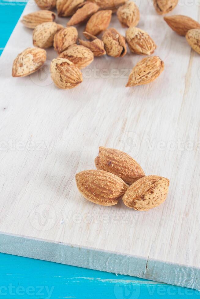 Almond on wood photo