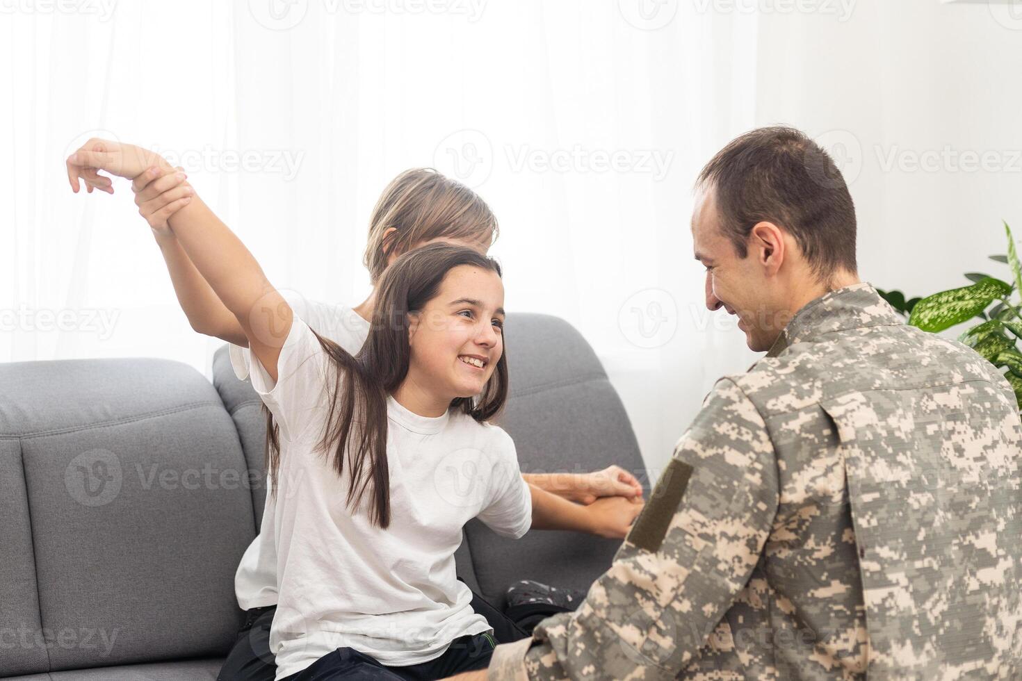 military father and two daughters at home photo