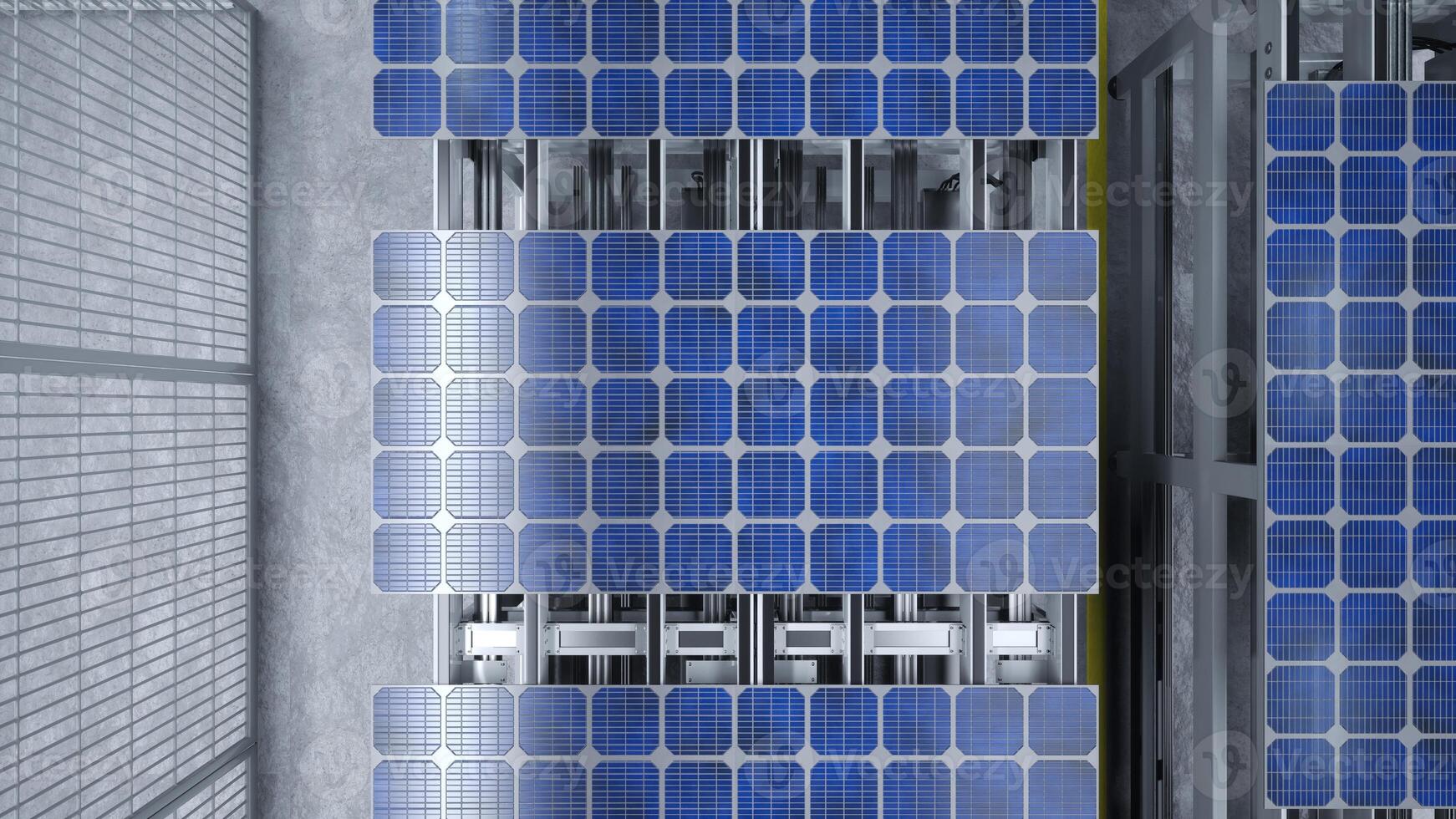 Top view of solar panel assembly line operated by high tech robot arms in modern sustainable factory. Aerial shot of photovoltaics production process taking place in automated facility photo