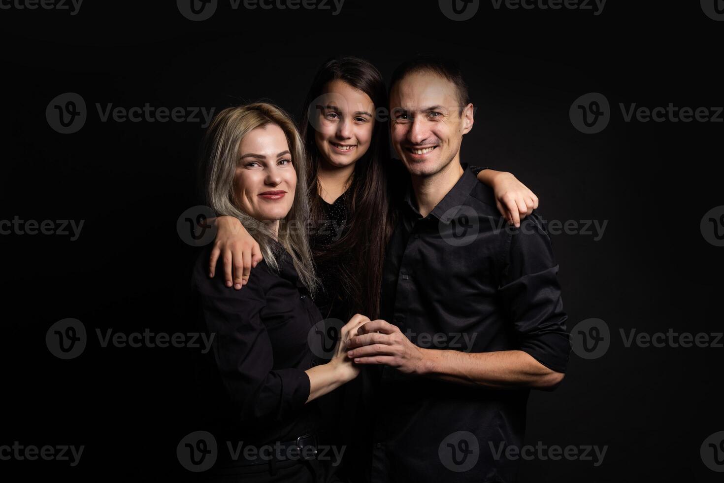family on a black background photo