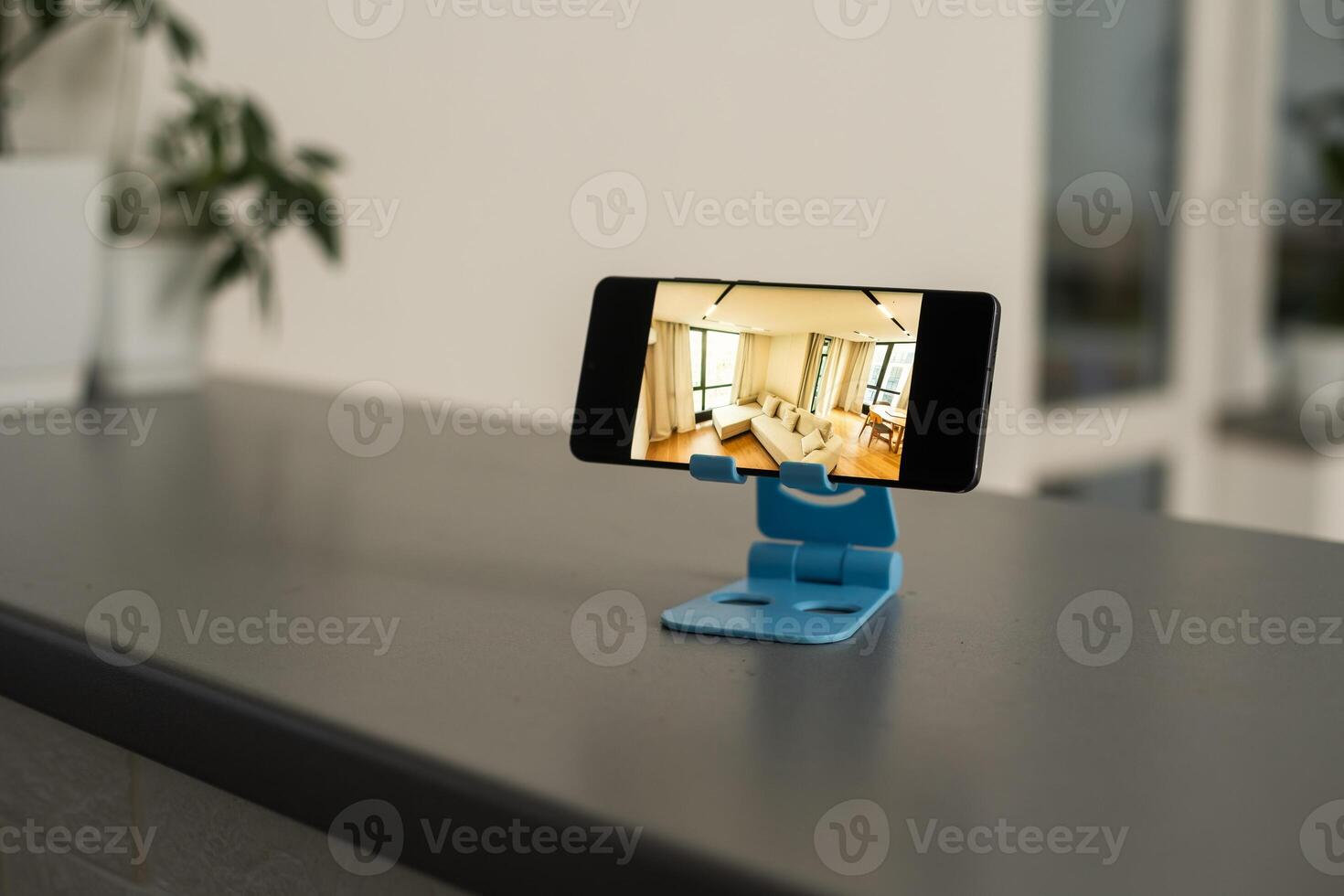 smartphone in a stand with design photo