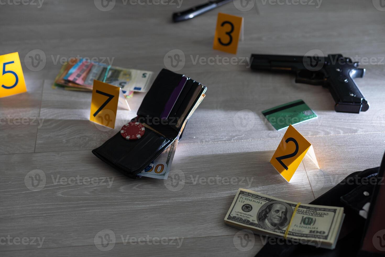 Flat lay composition with evidences and crime scene markers on wooden background photo