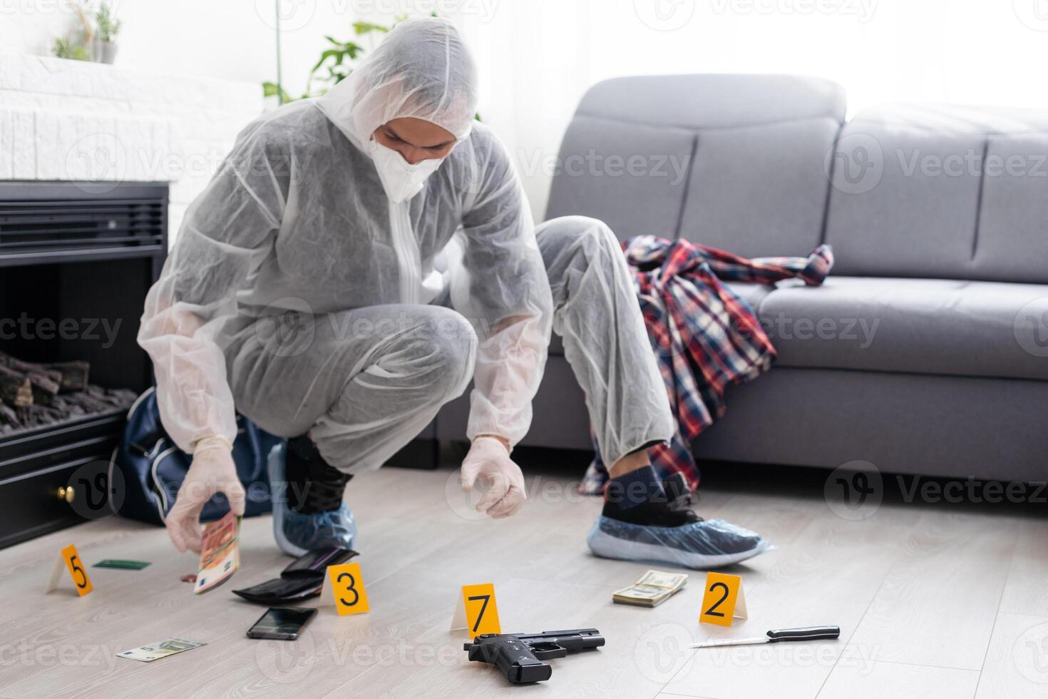 Forensics researcher photographing a blood at a murder scene photo