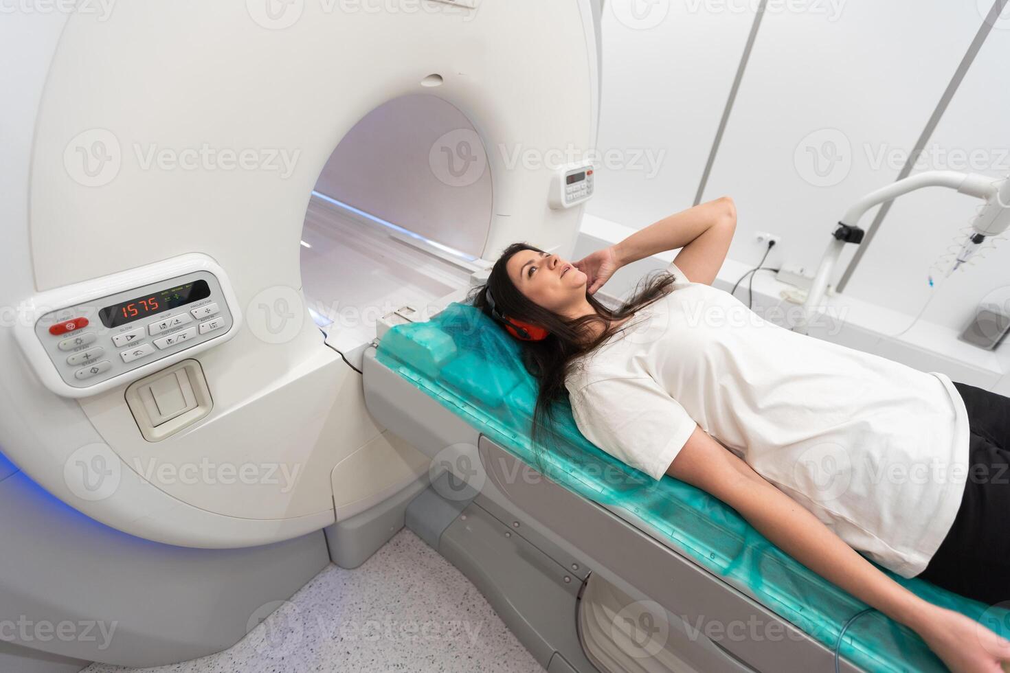 Medical CT or MRI Scan in the modern hospital laboratory. Interior of radiography department. Technologically advanced equipment in white room. Magnetic resonance diagnostics machine photo