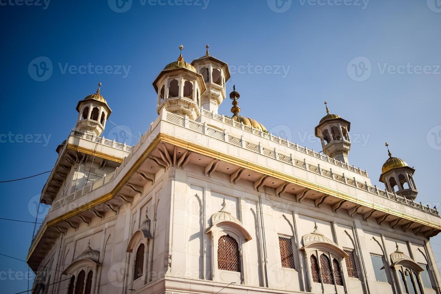 View of details of architecture inside Golden Temple - Harmandir Sahib in Amritsar, Punjab, India, Famous indian sikh landmark, Golden Temple, the main sanctuary of Sikhs in Amritsar, India photo