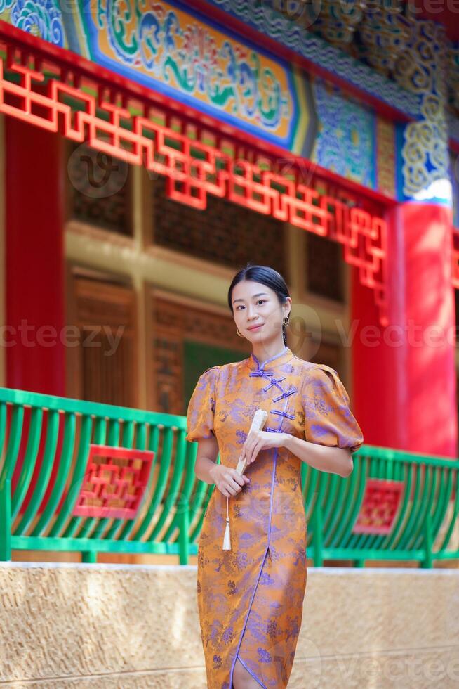 Chinese woman in traditional costume for Happy chinese new year concept photo