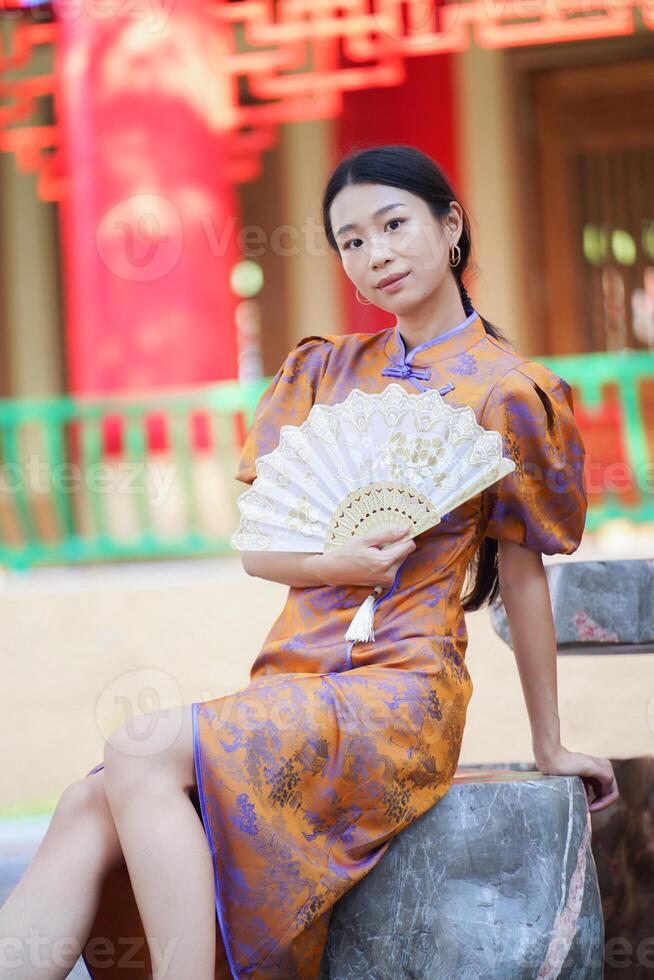 Chinese woman in traditional costume for Happy chinese new year concept photo