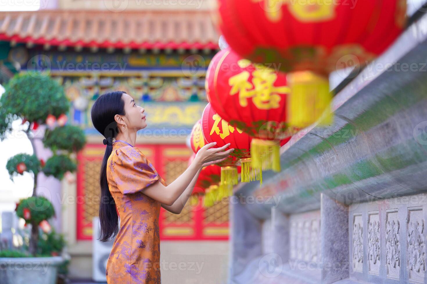 Chinese woman in traditional costume for Happy chinese new year concept photo