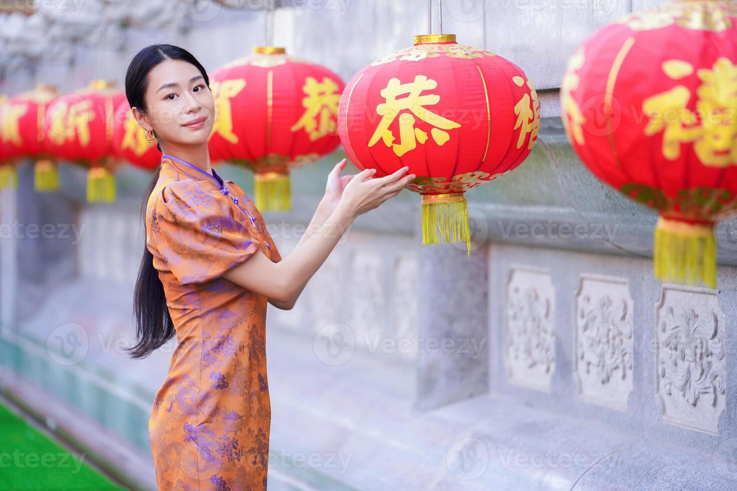 Chinese woman in traditional costume for Happy chinese new year concept photo