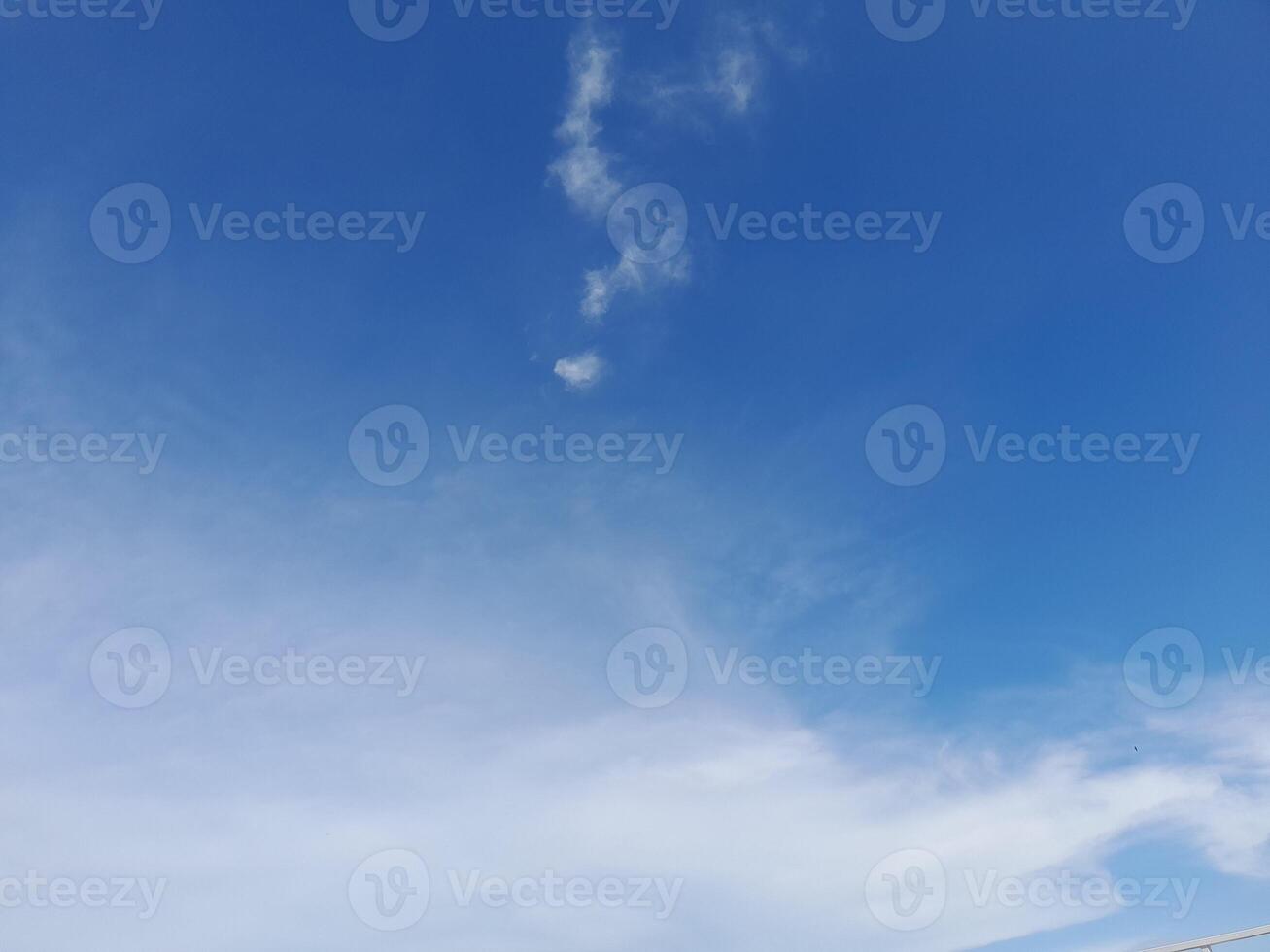 The white clouds on the blue sky are perfect for the background. Skyscape on Lombok Island, Indonesia photo