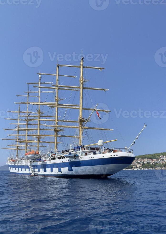 a large sailboat in the ocean photo