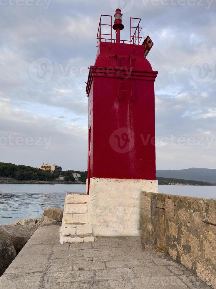 a red lighthouse photo