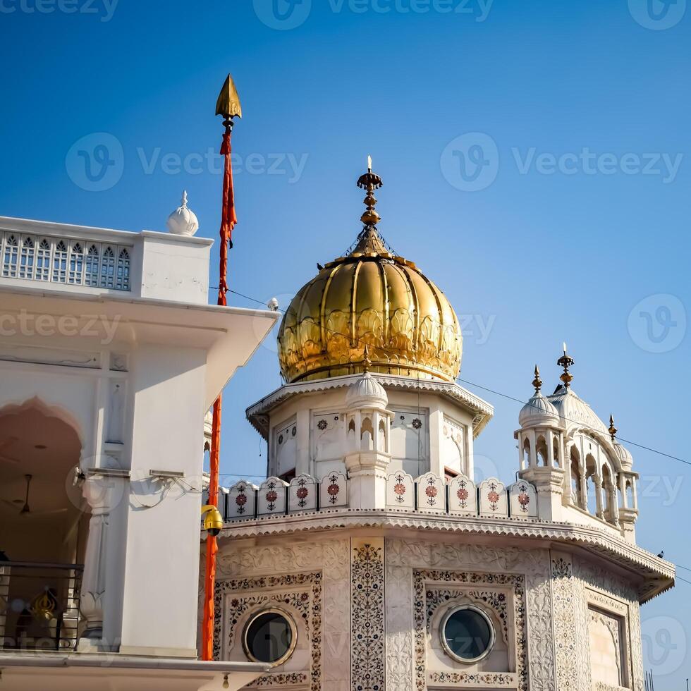 View of details of architecture inside Golden Temple - Harmandir Sahib in Amritsar, Punjab, India, Famous indian sikh landmark, Golden Temple, the main sanctuary of Sikhs in Amritsar, India photo