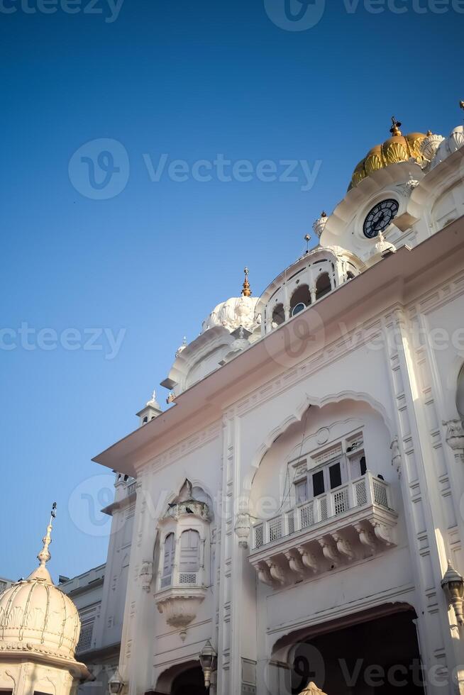 View of details of architecture inside Golden Temple - Harmandir Sahib in Amritsar, Punjab, India, Famous indian sikh landmark, Golden Temple, the main sanctuary of Sikhs in Amritsar, India photo