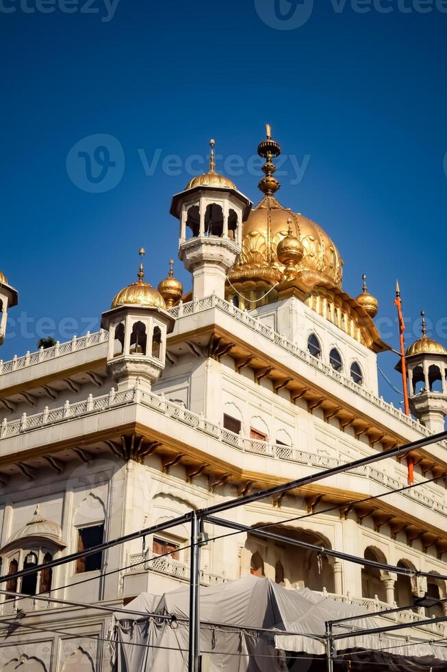 View of details of architecture inside Golden Temple - Harmandir Sahib in Amritsar, Punjab, India, Famous indian sikh landmark, Golden Temple, the main sanctuary of Sikhs in Amritsar, India photo