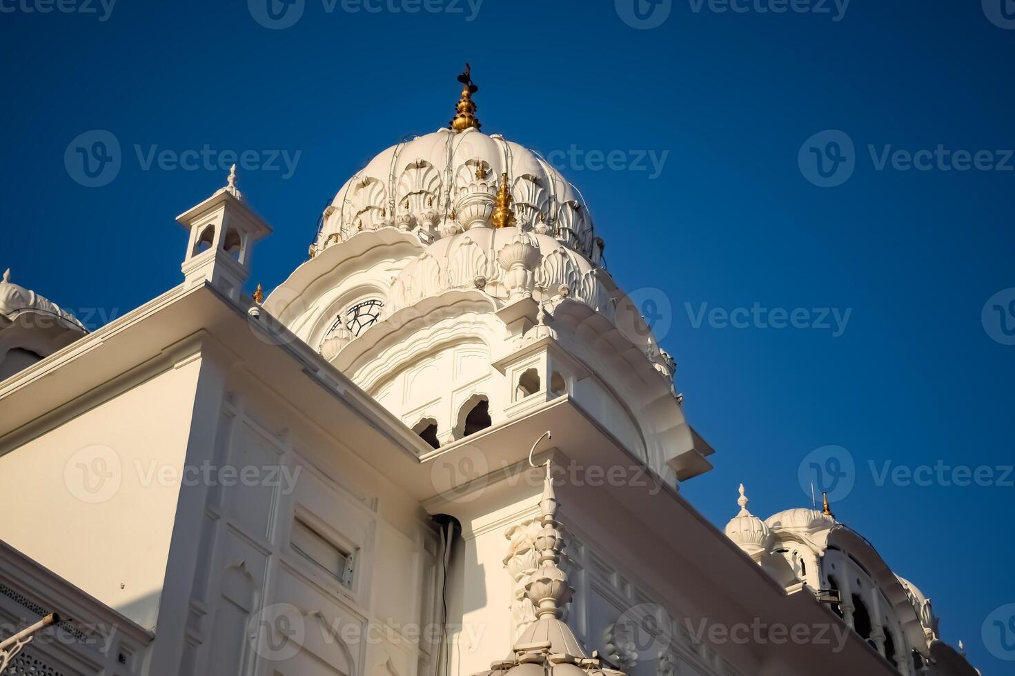 View of details of architecture inside Golden Temple - Harmandir Sahib in Amritsar, Punjab, India, Famous indian sikh landmark, Golden Temple, the main sanctuary of Sikhs in Amritsar, India photo