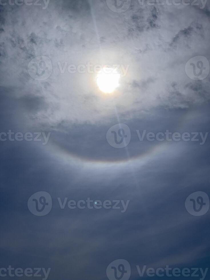 a sun halo is seen in the sky photo