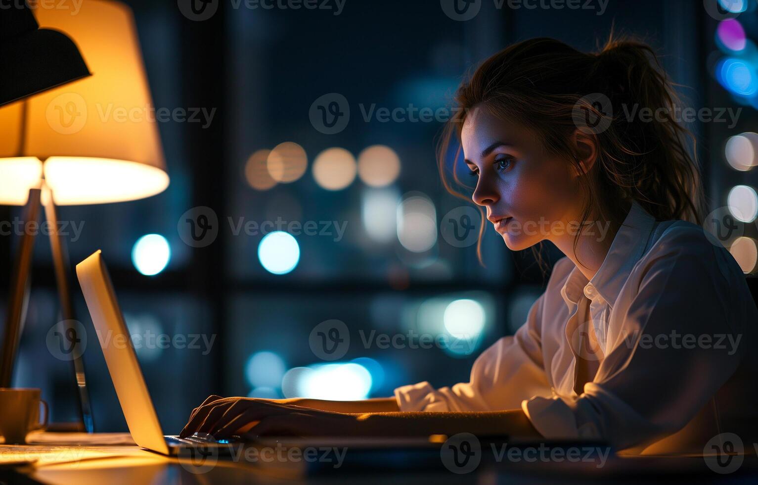 AI generated A woman working at night. Young businesswoman using a laptop during a late night in a modern office. photo