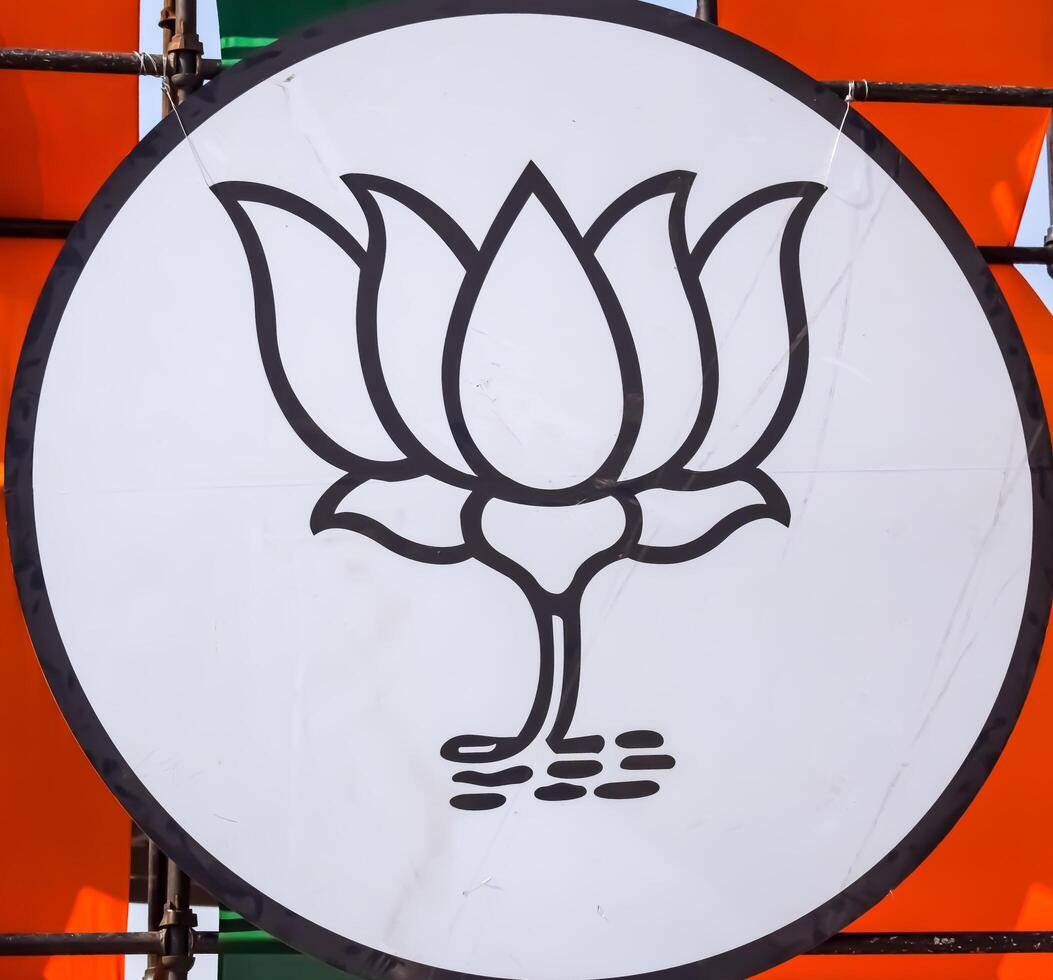 New Delhi, India - February 17 2024 - Bharatiya Janata Party Logo of Indian political party, BJP Bhartiya Janta Party Symbol during PM road show in Delhi, India, BJP Sign and Symbol photo