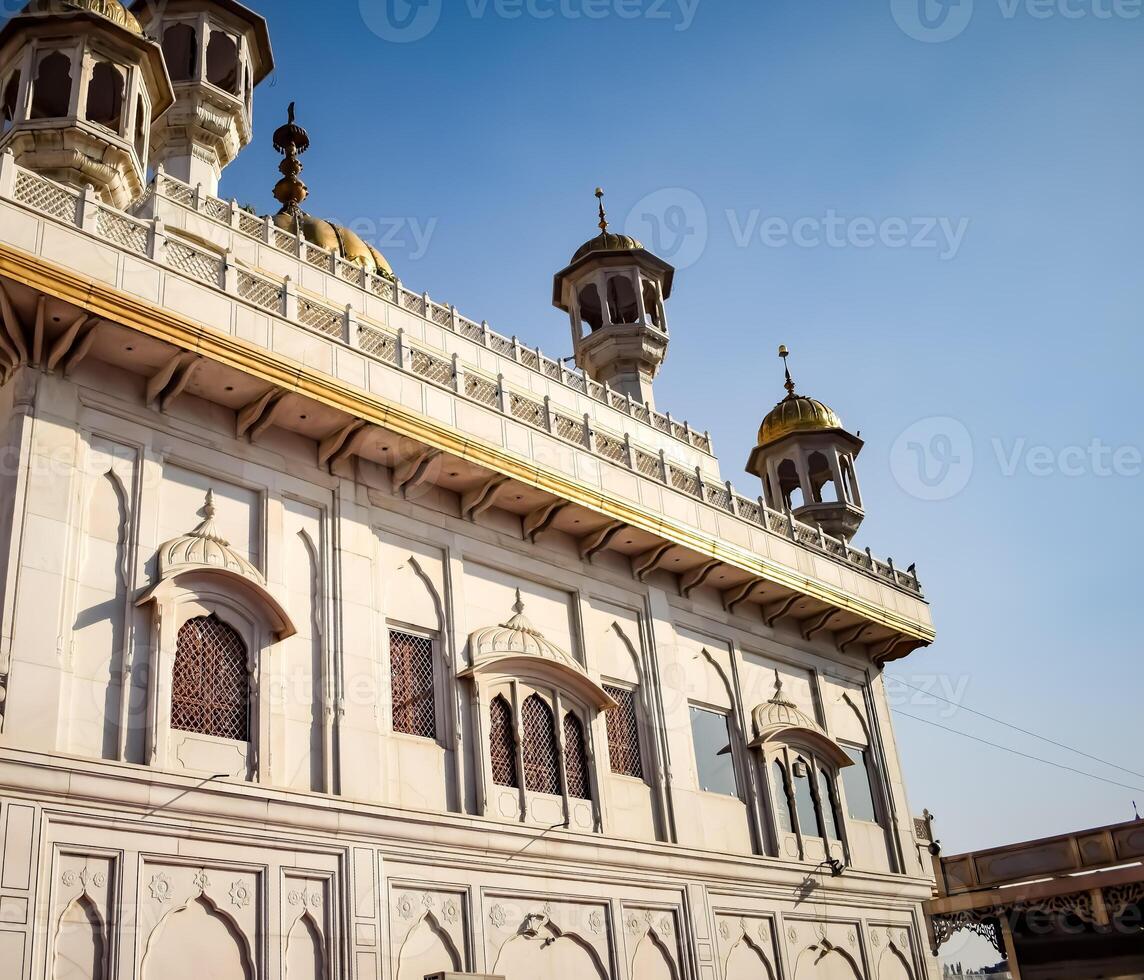 View of details of architecture inside Golden Temple - Harmandir Sahib in Amritsar, Punjab, India, Famous indian sikh landmark, Golden Temple, the main sanctuary of Sikhs in Amritsar, India photo