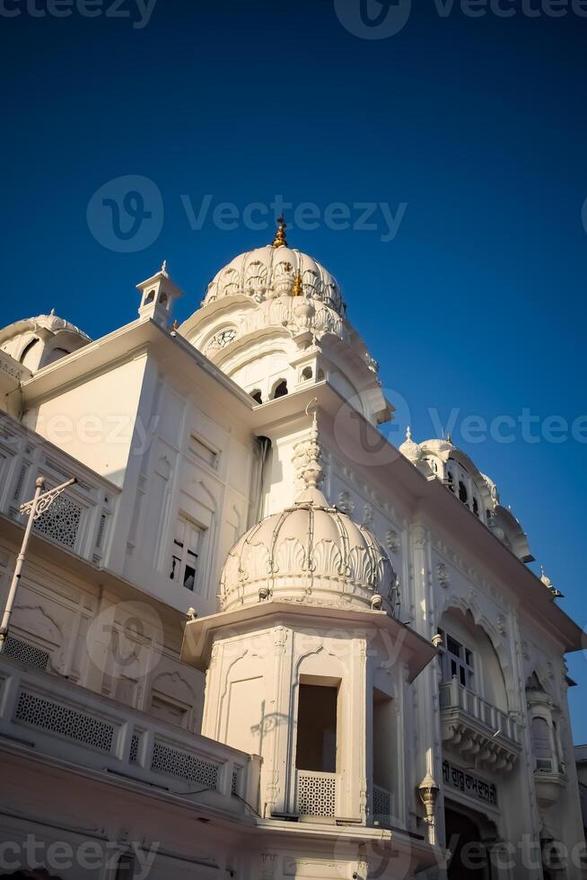 View of details of architecture inside Golden Temple - Harmandir Sahib in Amritsar, Punjab, India, Famous indian sikh landmark, Golden Temple, the main sanctuary of Sikhs in Amritsar, India photo